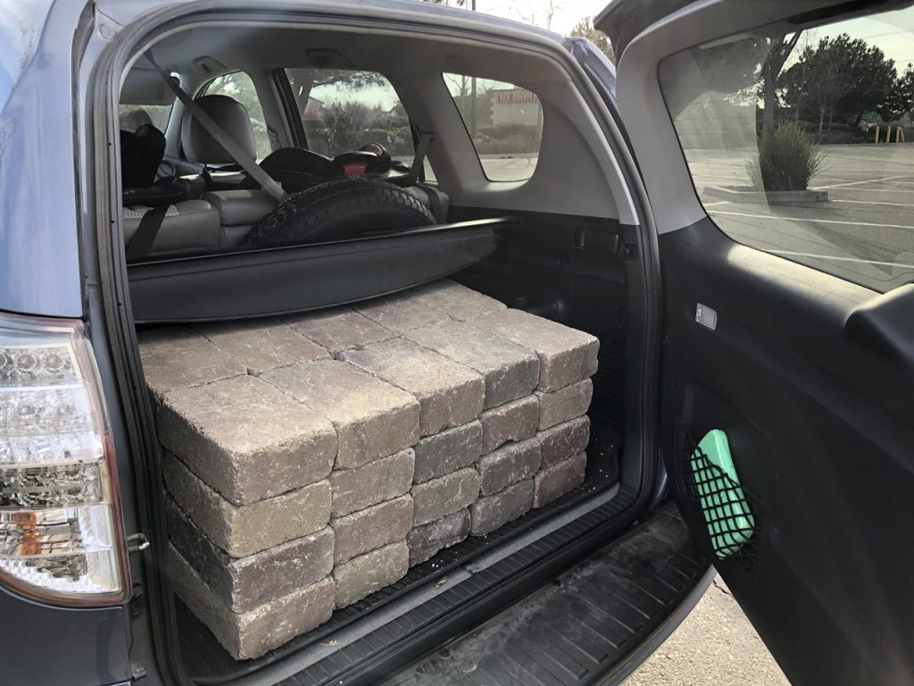 40 wall blocks at over 21 pounds each. The Rav4 EV suspension is not rated at a half ton, but this electric car has the space to handle the occasional heavy load.