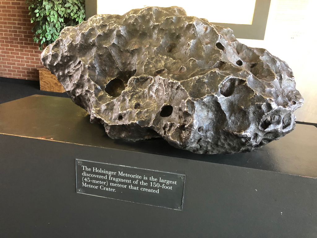 Picture of a 1300 pound fragment from the meteor that created Meteor Crater in Arizona.